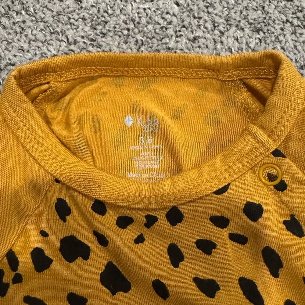 Kyte Baby Longall Romper in Marigold Cheetah EUC 3-6